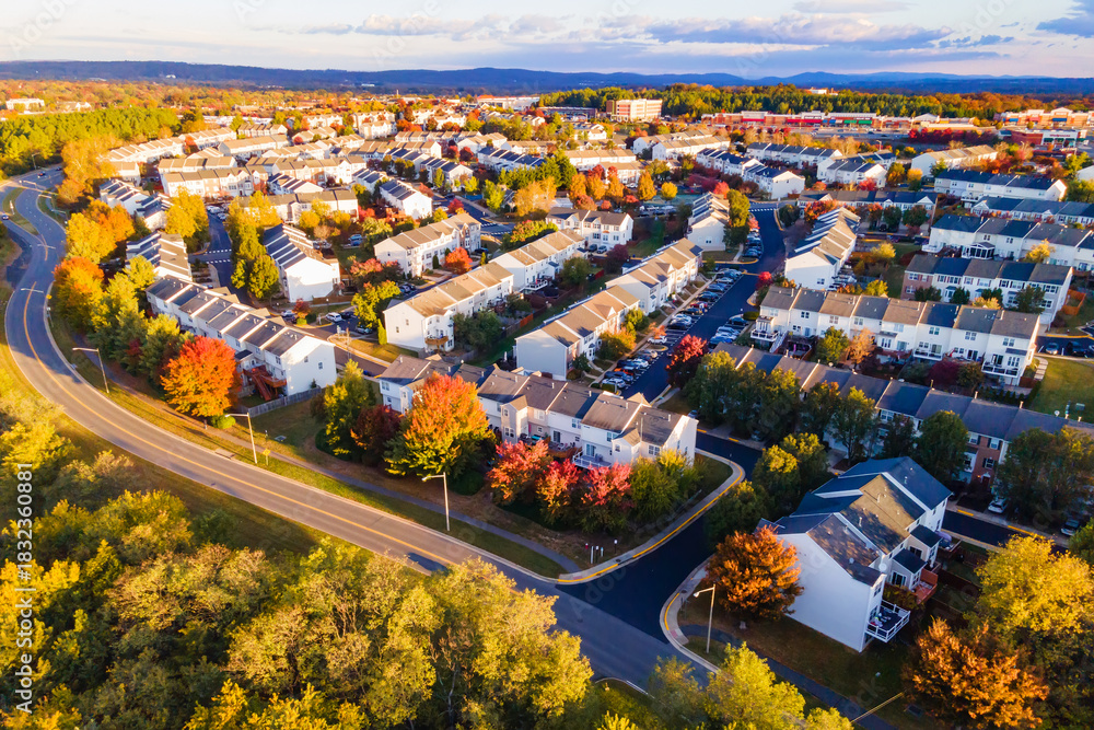 Fototapeta premium Aerial view of suburban townhomes near Washington, Virginia, at sunset