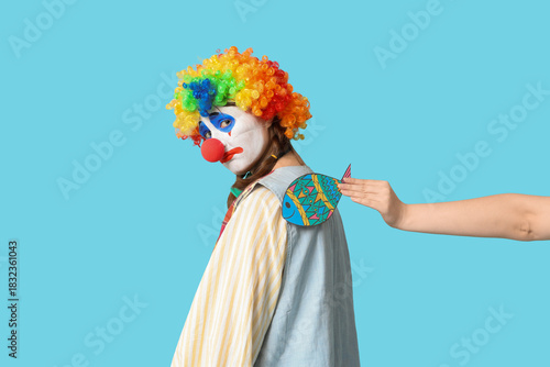 Young woman dressed as sad ...