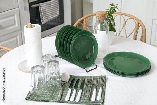 Set of clean dishes and gla...