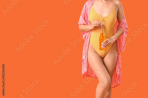 Young Asian woman in swimsu...