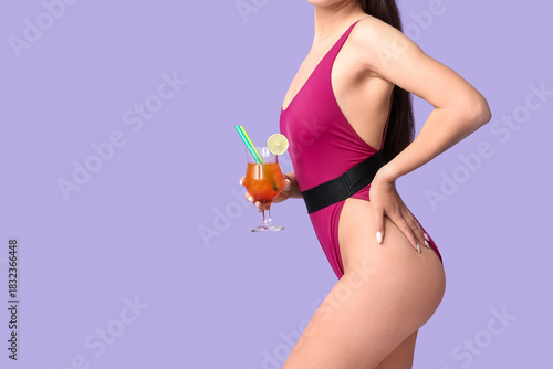 Young Asian woman in swimsu...