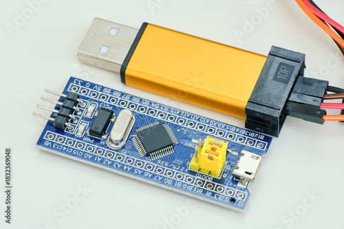 Programming board of Arduino UNO in blue colour isolated in white background
