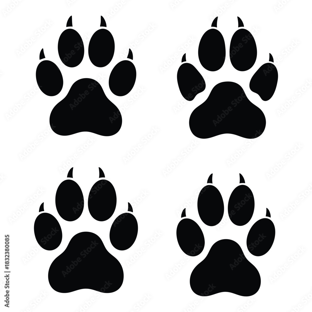 Fototapeta premium Four black dog paw prints on a white background