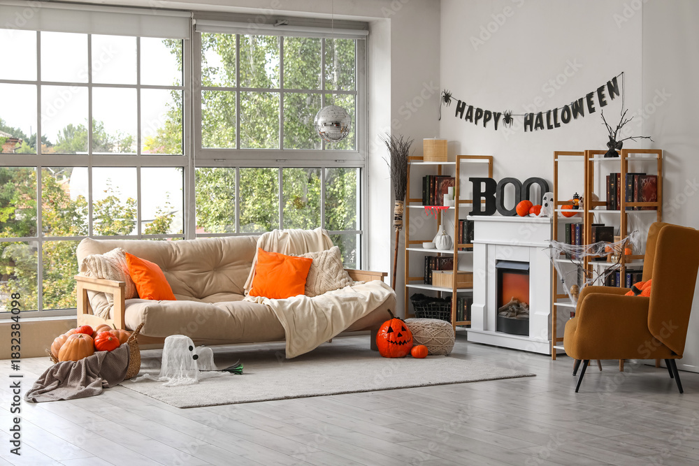 Fototapeta premium Interior of living room decorated for Halloween with sofa, disco ball, fireplace and pumpkins