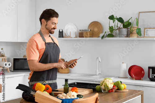 Handsome bearded man with t...