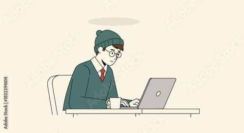 Young man working on laptop focused and concentrating on his work at the desk.