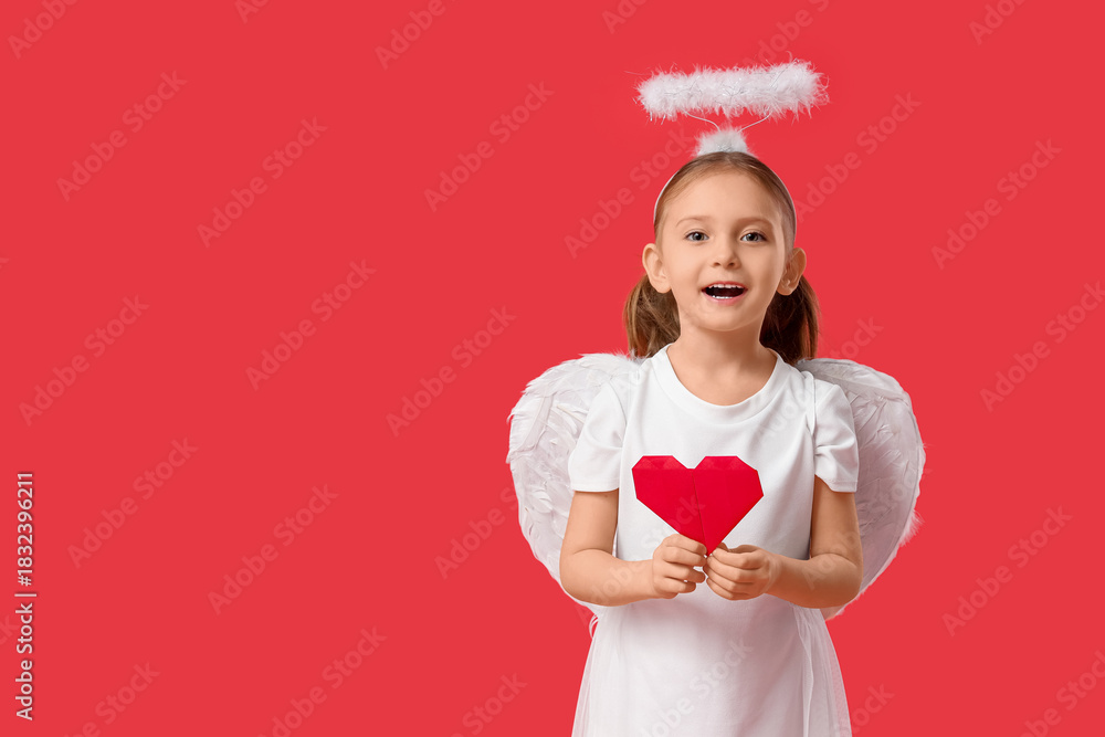 Obraz premium Cute little girl dressed as Cupid with heart made of paper on red background. Valentine's Day celebration