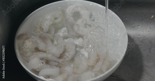 Defrosting Frozen Shrimp Under Running Cold Water
