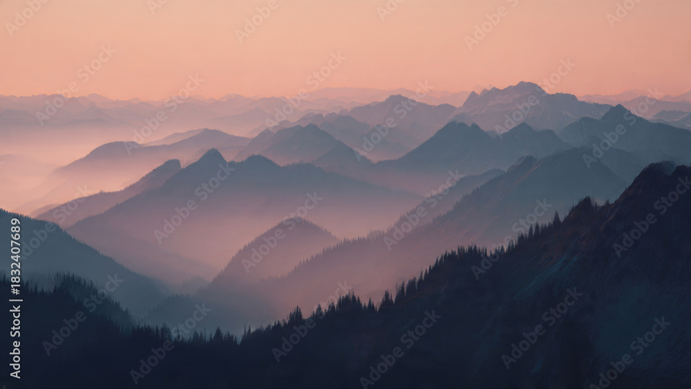 Fototapeta premium Majestic mountain ranges recede into soft, hazy distance under a warm, serene twilight sky, showcasing nature's breathtaking atmospheric beauty and depth.