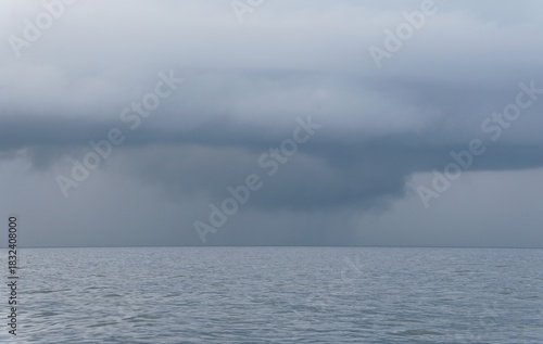 Shelf cloud looms over a calm sea, signaling potential severe weather and atmospheric instability ahead near Madeira Beach, Florida, U.S