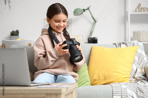 Cute girl with photo camera...