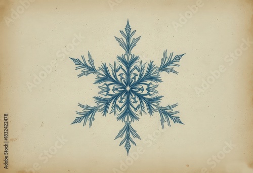 Intricate Vintage Etching Snowflake Ornament in Blue on Textured Aged Paper Background with Copy Space