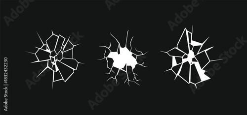Cracked glass effect vector set. Realistic broken screen hole design element. Abstract shattered broken surface grunge texture vector elements. Destruction concept