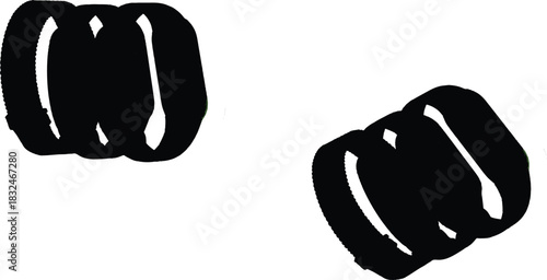  watch design described showcases two black, coil-shaped objects set against a stark white background, creating a strong visual contrast. The object on the left is upright, highlighting its defined 