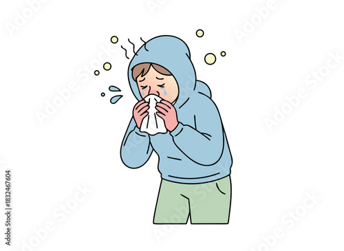 Person Wearing Light Blue Hoodie and Green Pants Blowing Nose With White Tissue Looking Sick and Unwell Surrounded by Yellow Pollen Particles on Black Background