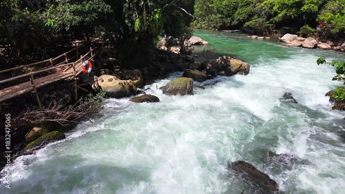 Superb view of summer: Slow motion of the fantastic Moot valley in Phong Nha National Park, Vietnam with the sound of a clear stream flowing through the peaceful tropical jungle