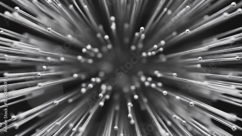 Silver Needles Expand and Contract on a Black Background, Close Up