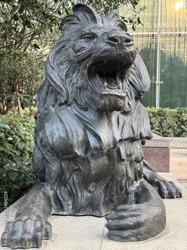 lion statue in front of palace