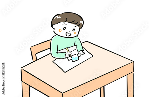 お絵描き、色塗りをする男の子