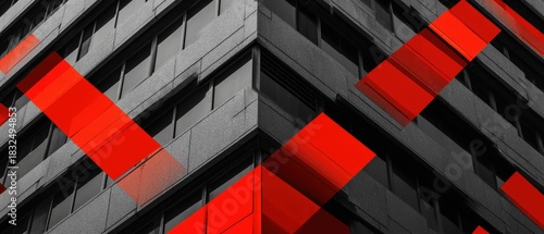 Modern office building facade with geometric black glass windows and bold red accents