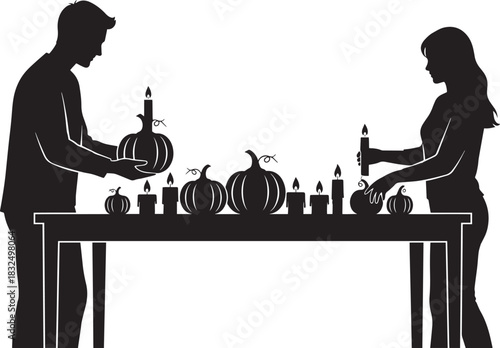 Silhouetted couple prepares the table with pumpkins and candles for a special evening mood
