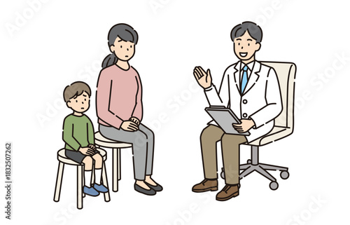 診察室での医師と親子