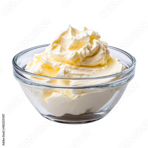 Creamy butter in a glass bowl, perfect for cooking or baking, isolated on a white background.
