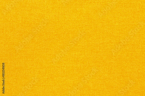 Yellow fabric cloth texture background, seamless pattern of natural textile.
