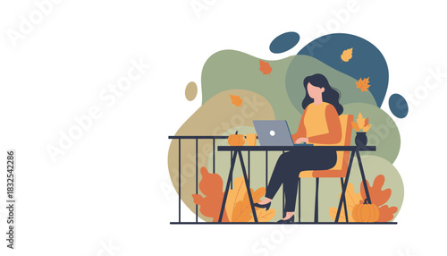 Woman working remotely on a laptop on an autumn balcony with pumpkins and falling leaves