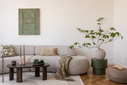 Cozy living room with a soft sectional, rustic coffee table, and lush plants, perfect for relaxing in style. Home decor.