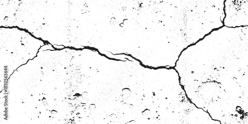 Close up of a cracked white surface showing damage and texture.