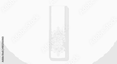 Elegant white candle with intricate snowflake design on a soft pastel background