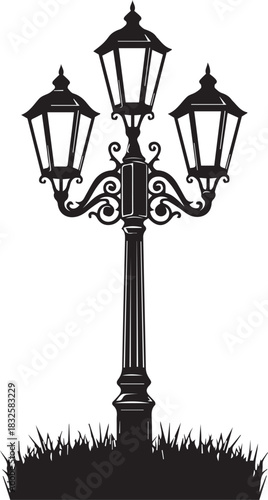 Elegant vintage street lamp silhouette with ornate details and grassy base