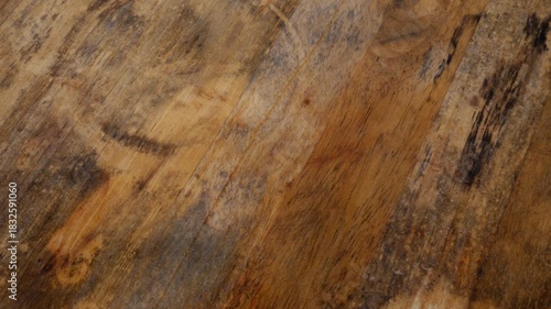 Wet Wooden Floor Surface: Water Stains and Moisture on Natural Wood Grain Texture Background with Scratches