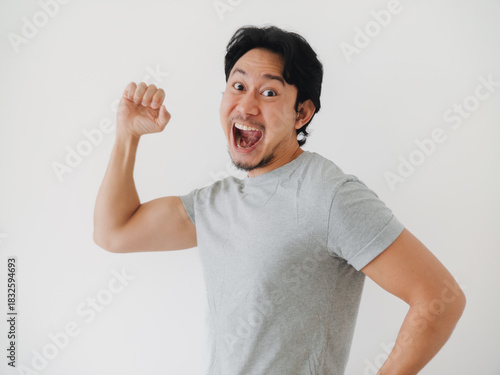 A Joyful Man is Celebrating His Success with Enthusiasm and Great Energy in This Moment