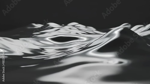 Glossy liquid-metal waves ripple gracefully with reflective surfaces and premium high-shine movement