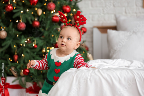 Cute little baby in elf cos...