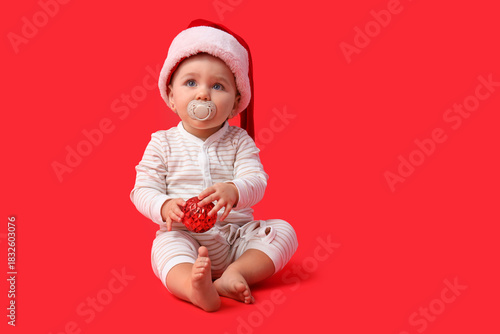 Adorable baby in santa hat ...