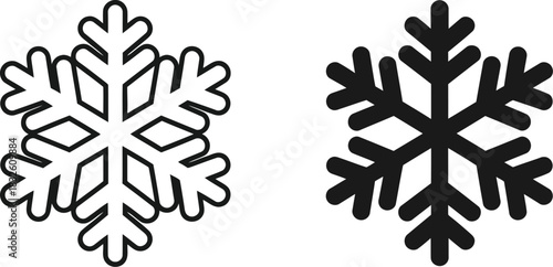 Two delicate snowflake icons black lines against a clear space on — Outline, silhouette, and on transparent background. EPS 10.