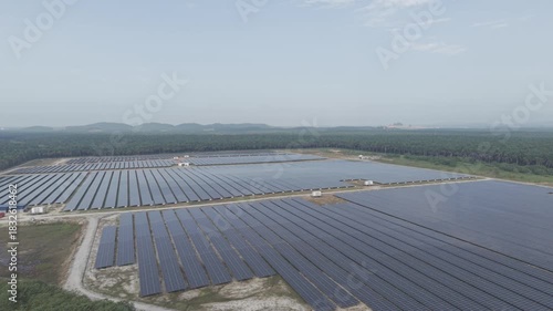 Aerial view of solar panel farm. Green renewable energy resources. Future of sustainable energy generation. Zero pollution concept.