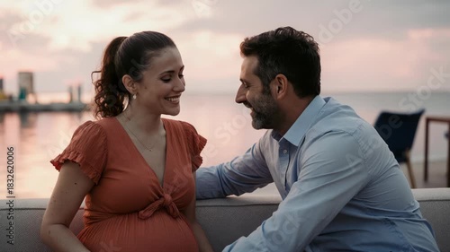 Happy Couple Laughing Together During Sunset Outdoor Date