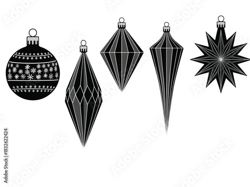 A collection of black and white Christmas ornaments in various decorative shapes, isolated on white.