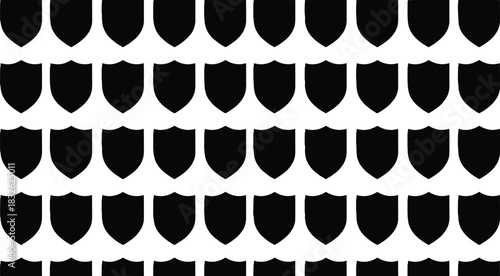 Large geometric pattern background of multiple identical black vector shield silhouettes, symbolizing protection, security, defense, strength, warranty, safety, privacy, and medieval 