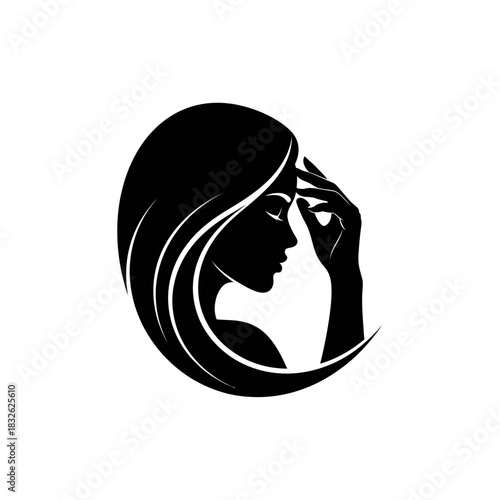 Elegant silhouette of a woman with flowing hair and contemplative expression