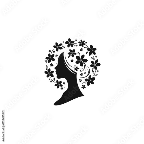 Elegant silhouette of a woman's profile integrated with floral motifs and