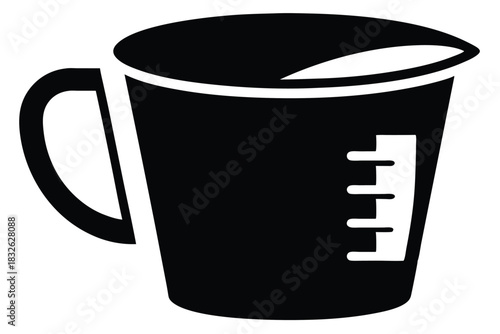 Isolated black measuring cup shows graduated markings, showcasing accuracy and precision in kitchen tasks