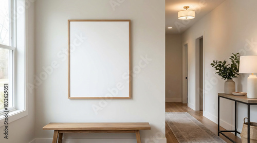 Modern Entryway with a Blank Frame Mockup, a Stylish Wooden Bench, and Elegant Hallway Decor
