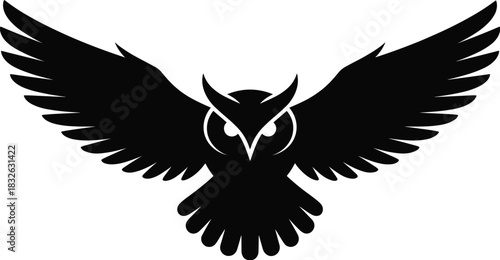 Striking black silhouette of a nocturnal owl flying with wide-spread wings, symbolizing wisdom and knowledge.