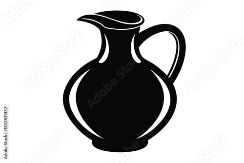 A simple black jug with handle and spout sits centrally within the frame