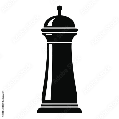 Black pepper grinder with a round top and a cylindrical body stands upright